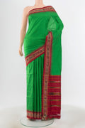 Mint Green Pochampally Saree with Ikat Print on the body and Silk Border.  displayed on a mannequin