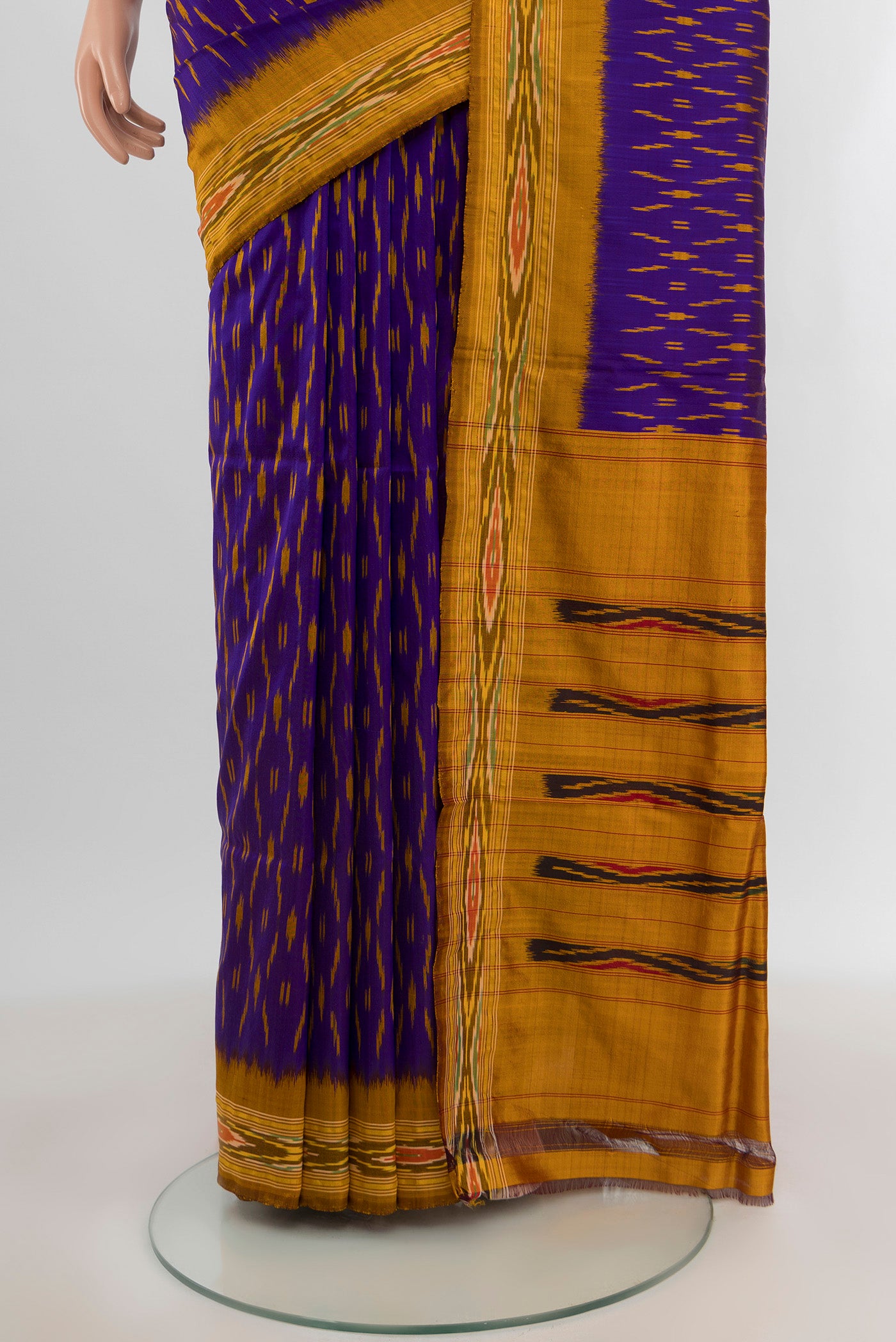 Pleats and pallu of Violet Pochampally Silk Saree with Ikat design on the body and Zari Border. 