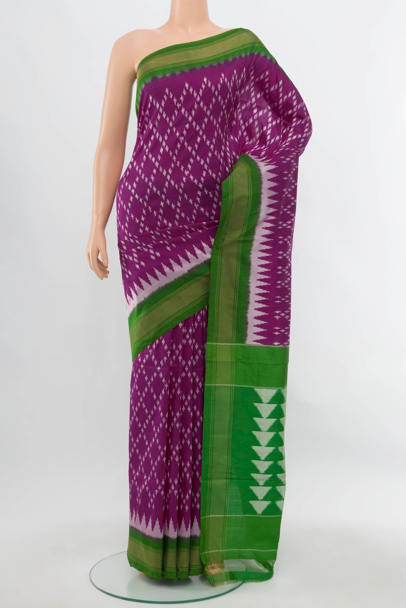 Purple Pochampally Saree with Ikat Print on the body and Silk Border.  displayed on a mannequin