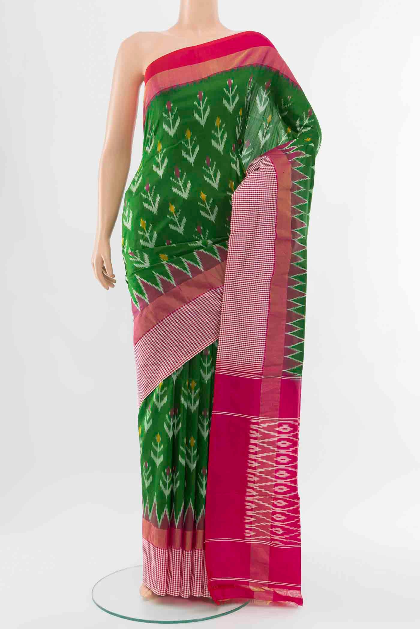 Green Pochampally Silk Saree with Pure Ikat on the body and Checks Border displayed on a mannequin