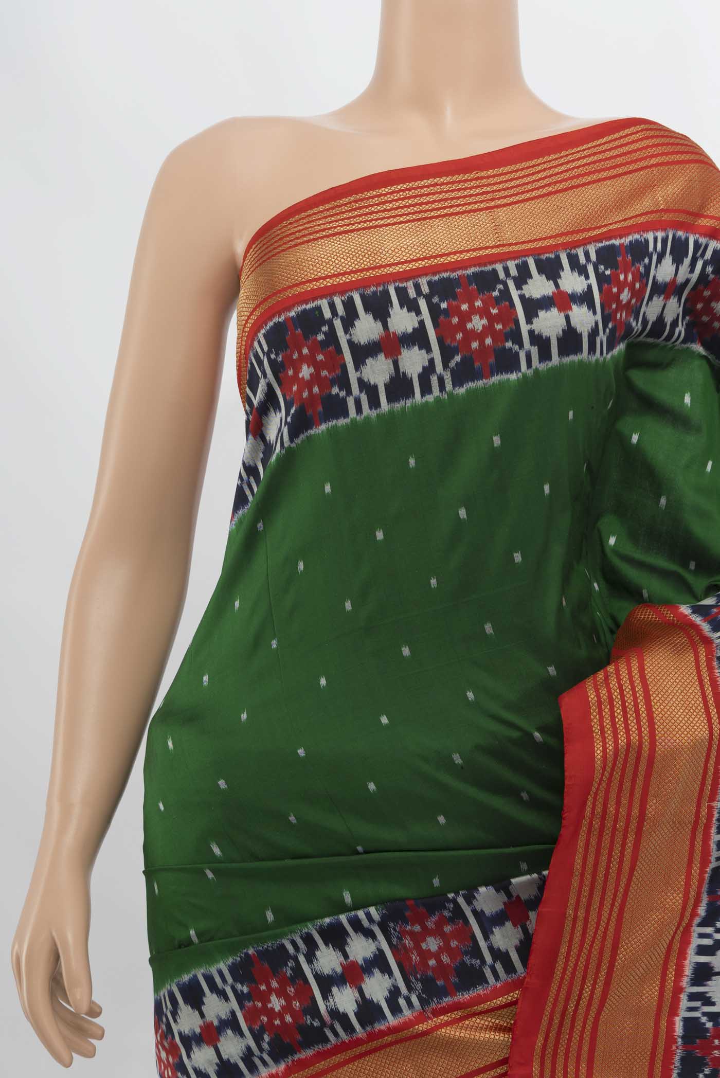 Border image of Bottle Green Pochampally Saree with Ikat Print on the body and Silk Border. 