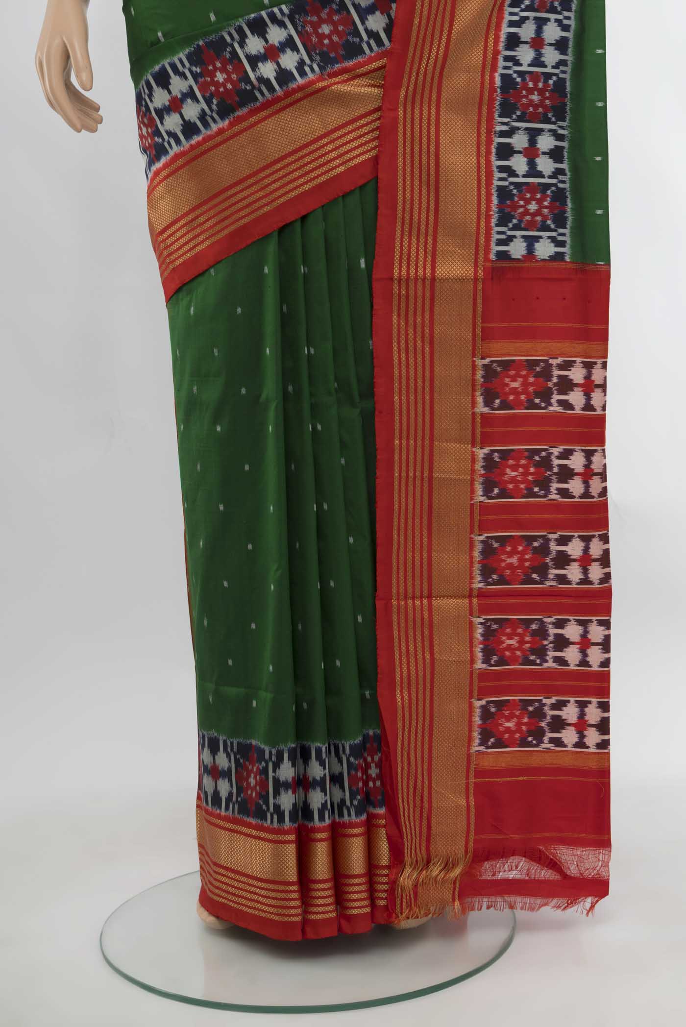 Pleats and pallu of Bottle Green Pochampally Saree with Ikat Print on the body and Silk Border. 