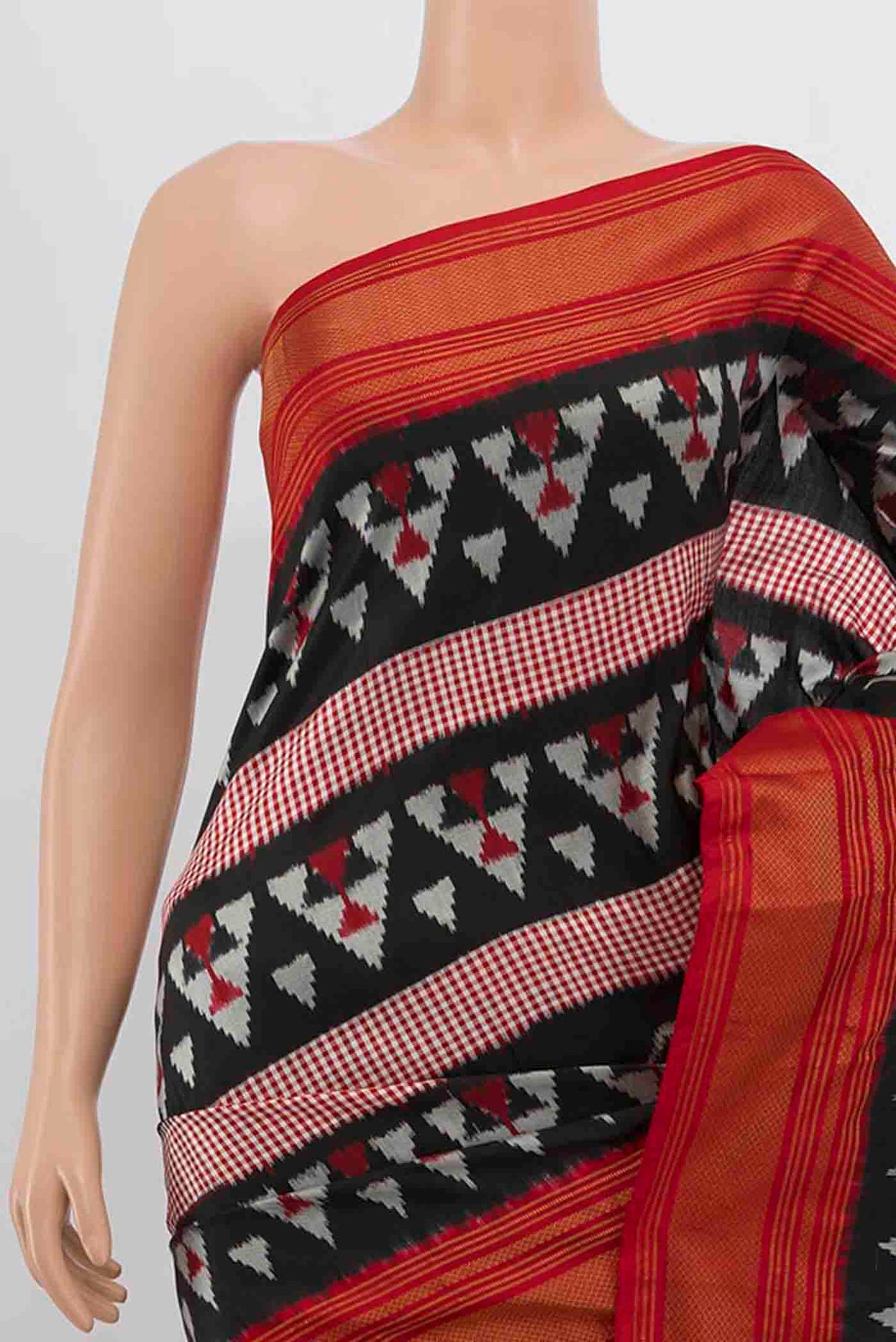 Border image of Black Pochampally Silk Saree with Pure Ikat on the body and Zari Border