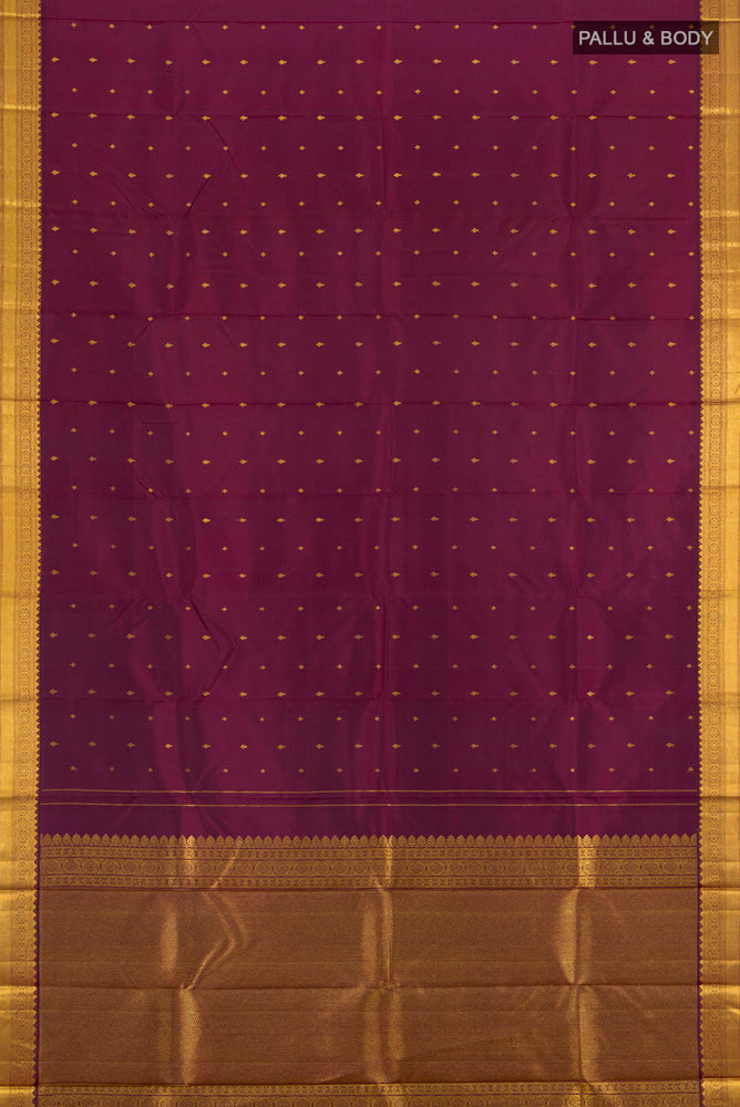 Flat view of Coffee Brown Kanchipuram Silk Saree with Zari Butta on the body and Silk Border. 