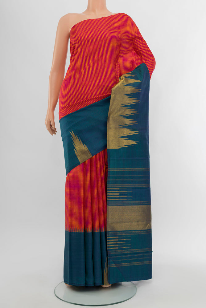 Pure Silk Pure Zari Multi Color Kanjivaram Saree with Zari Butta on the body and Silk Border.  displayed on a mannequin