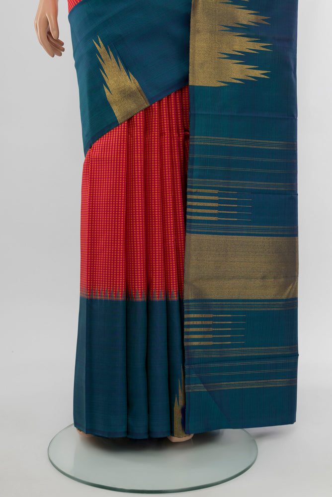 Pleats and pallu of Pure Silk Pure Zari Multi Color Kanjivaram Saree with Zari Butta on the body and Silk Border. 