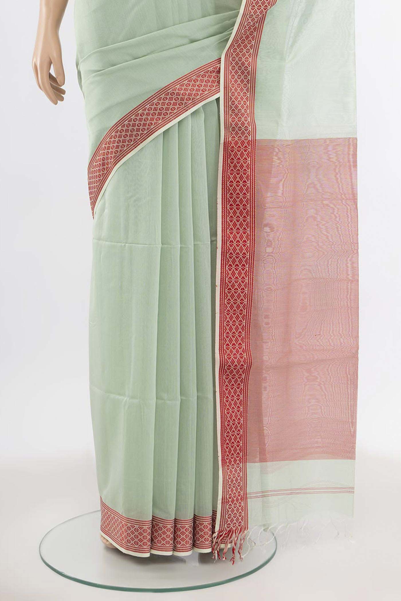 Pleats and pallu of Pista Green Maheshwari Silk Cotton Saree with Zari Butta on the body and Silk Border. 