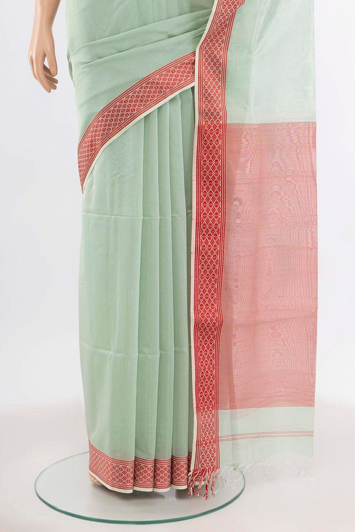 Pleats and pallu of Pista Green Maheshwari Silk Cotton Saree with Zari Butta on the body and Silk Border. 