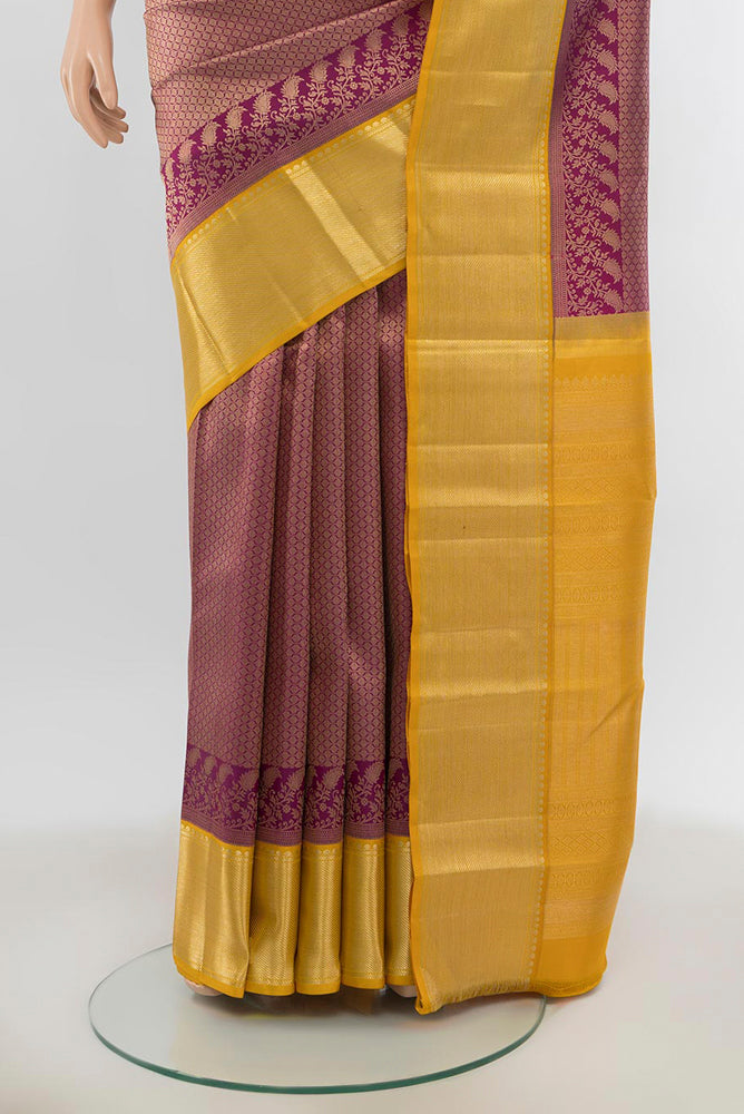 Pleats and pallu of Pure Silk Pure Zari Purple Kanjivaram Saree with Zari Brocade on the body and Silk Border. 