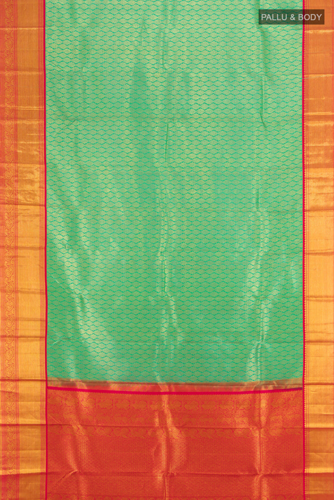 Flat view of Light Green Kanjivaram Silk Saree with Zari Butta on the body and Silk Border. 