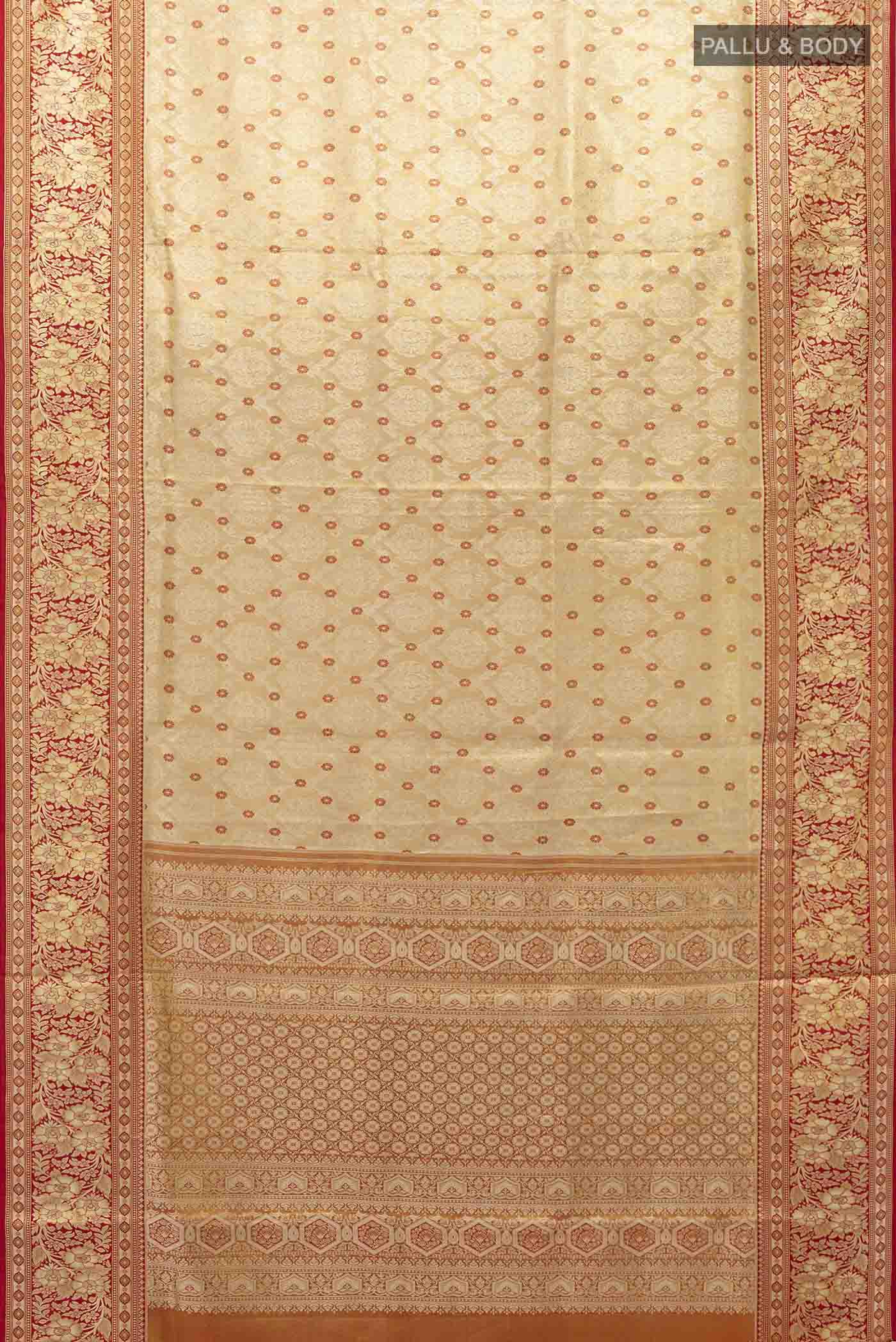 Flat view of Gold Kanchipuram Tissue Silk Saree with Zari Brocade on the body and Zari Border