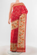 Pure Silk Pure Zari Red Kanchipuram Saree with Zari Butta on the body and Silk Border.  displayed on a mannequin