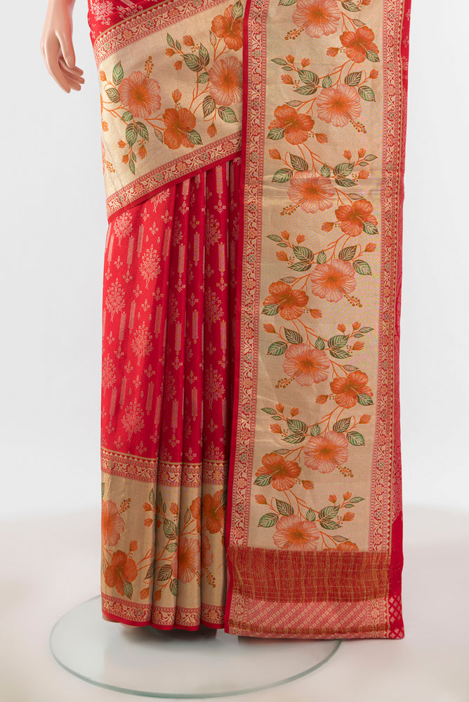 Pleats and pallu of Pure Silk Pure Zari Red Kanchipuram Saree with Zari Butta on the body and Silk Border. 
