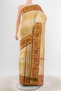 Golden Kanchipuram Silk Saree with Zari Butta on the body and Silk Border.  displayed on a mannequin