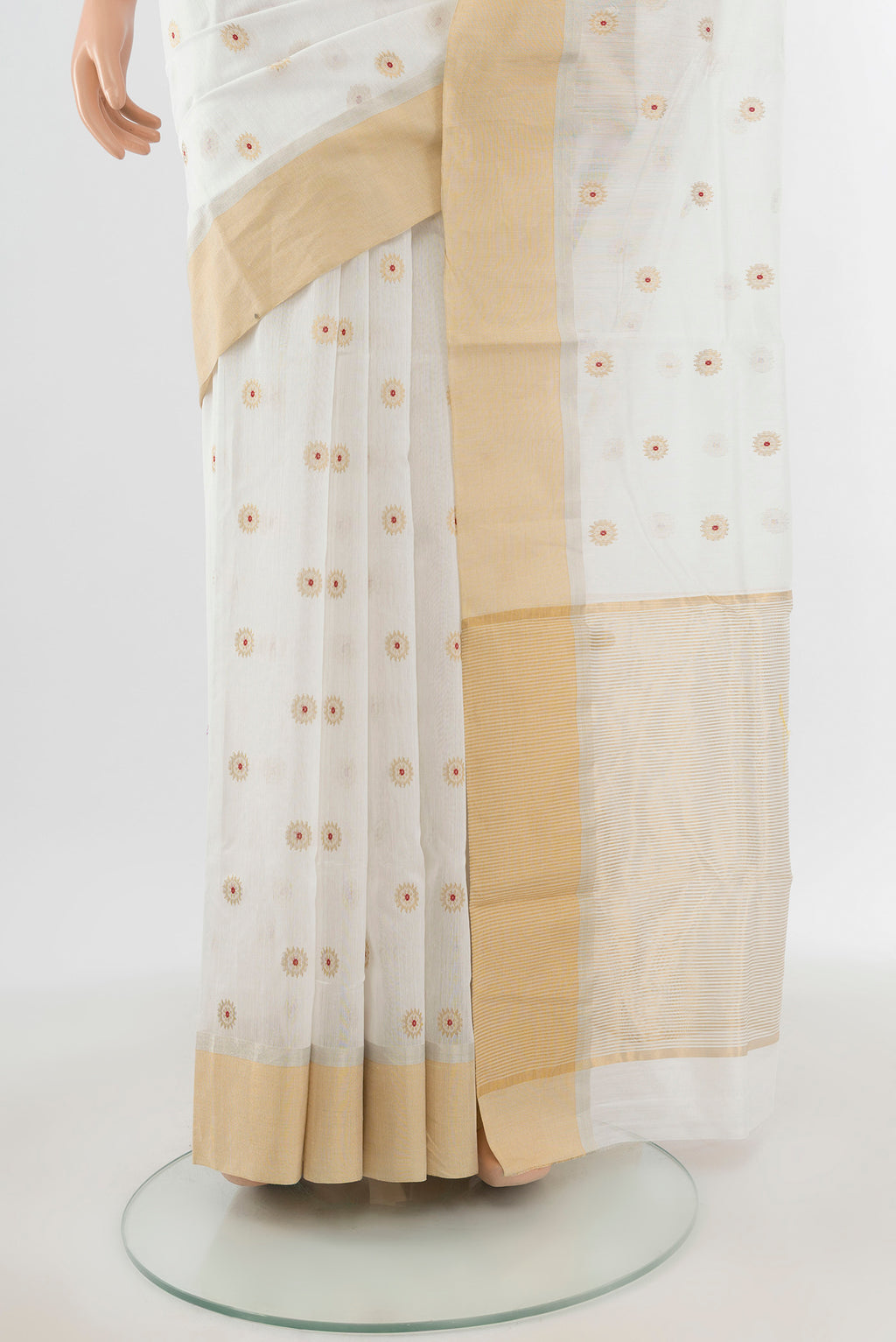 Pleats and pallu of White Chanderi Silk Cotton Saree with Zari Butta on the body and Zari Border. 