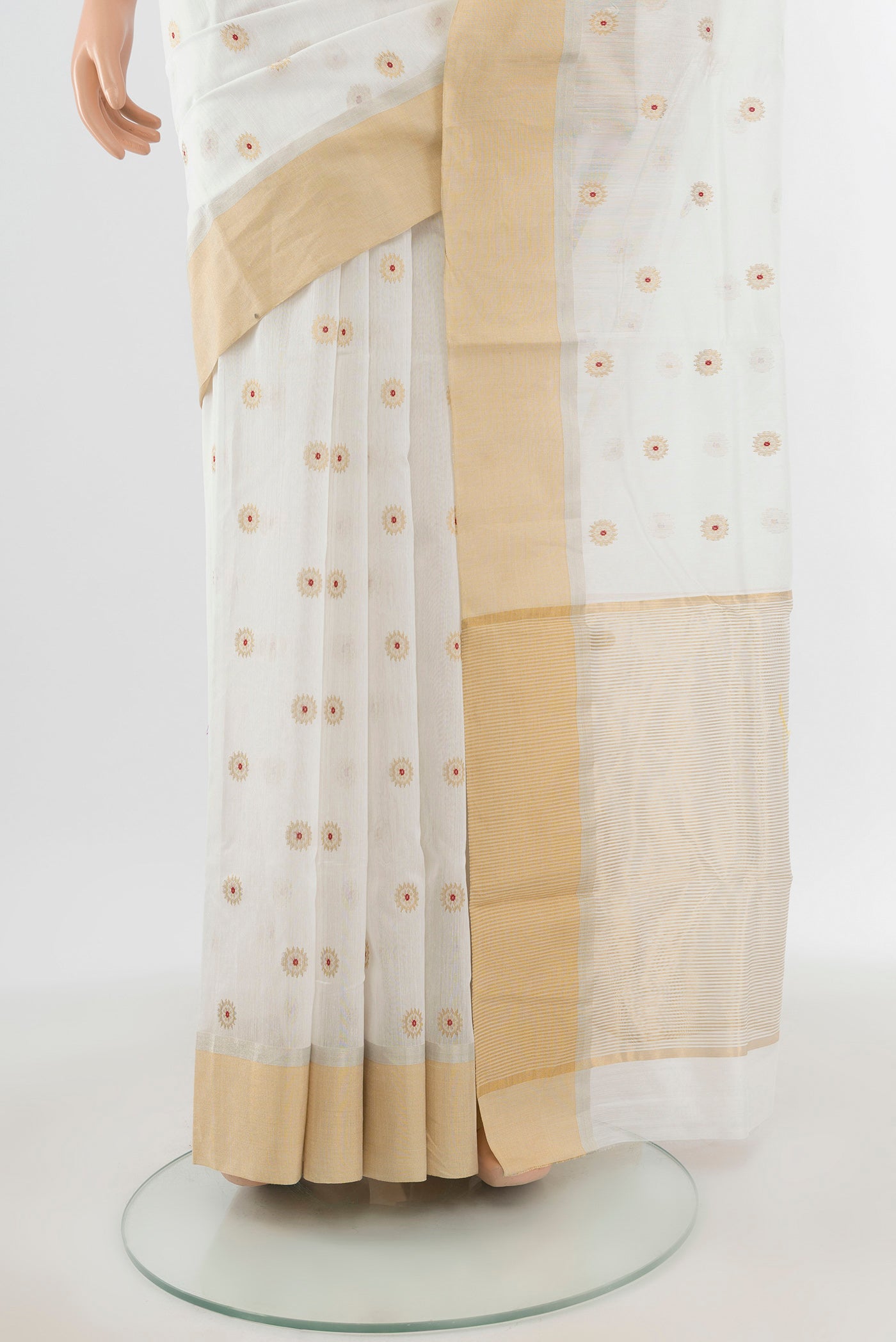 Pleats and pallu of White Chanderi Silk Cotton Saree with Zari Butta on the body and Zari Border. 