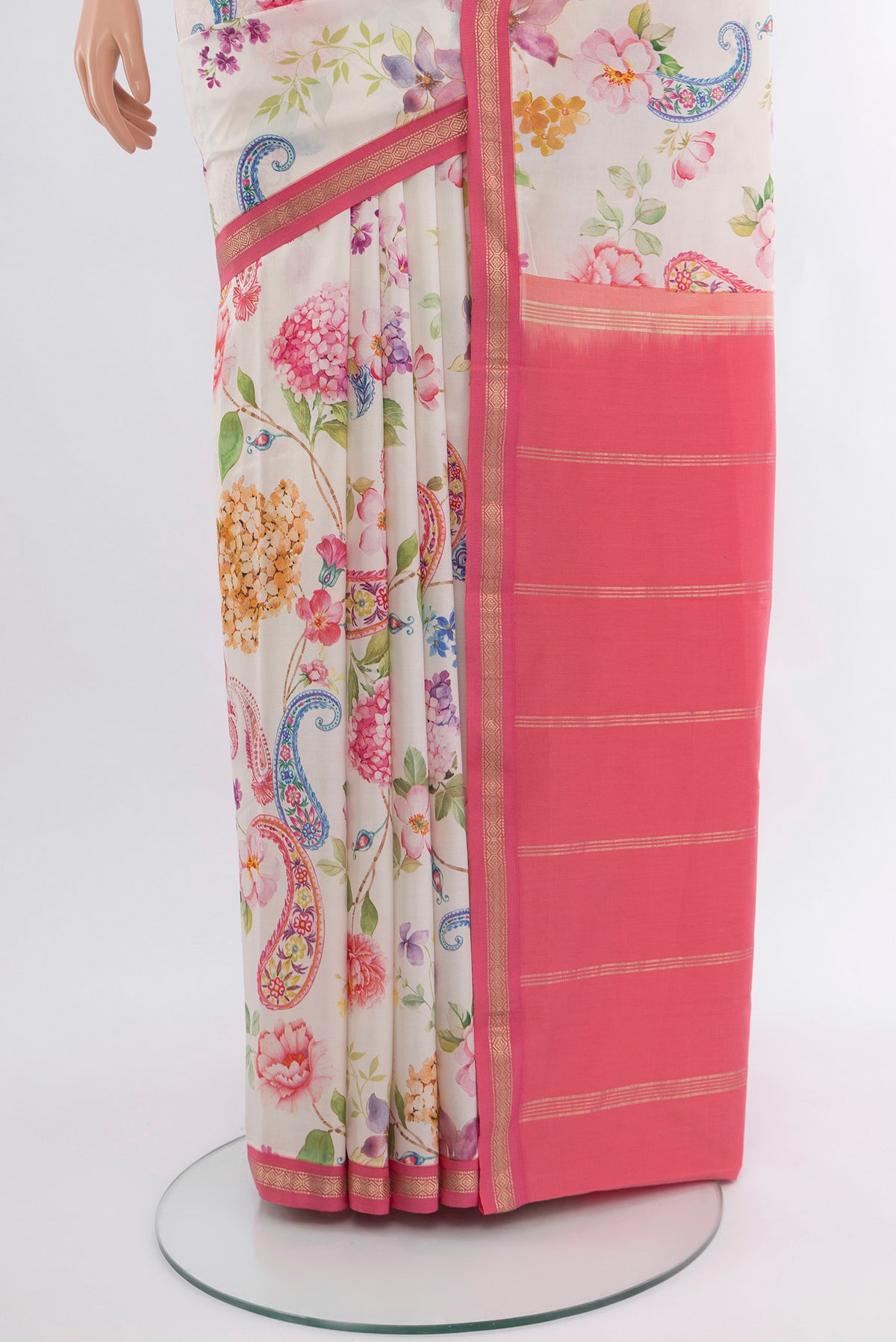 Pleats and pallu of Off White Printed Silk Saree with Floral Print on the body and Zari Border. 