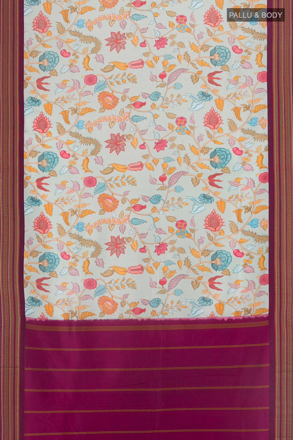 Flat view of Grey Printed Silk Saree with Floral Print on the body and Zari Border. 