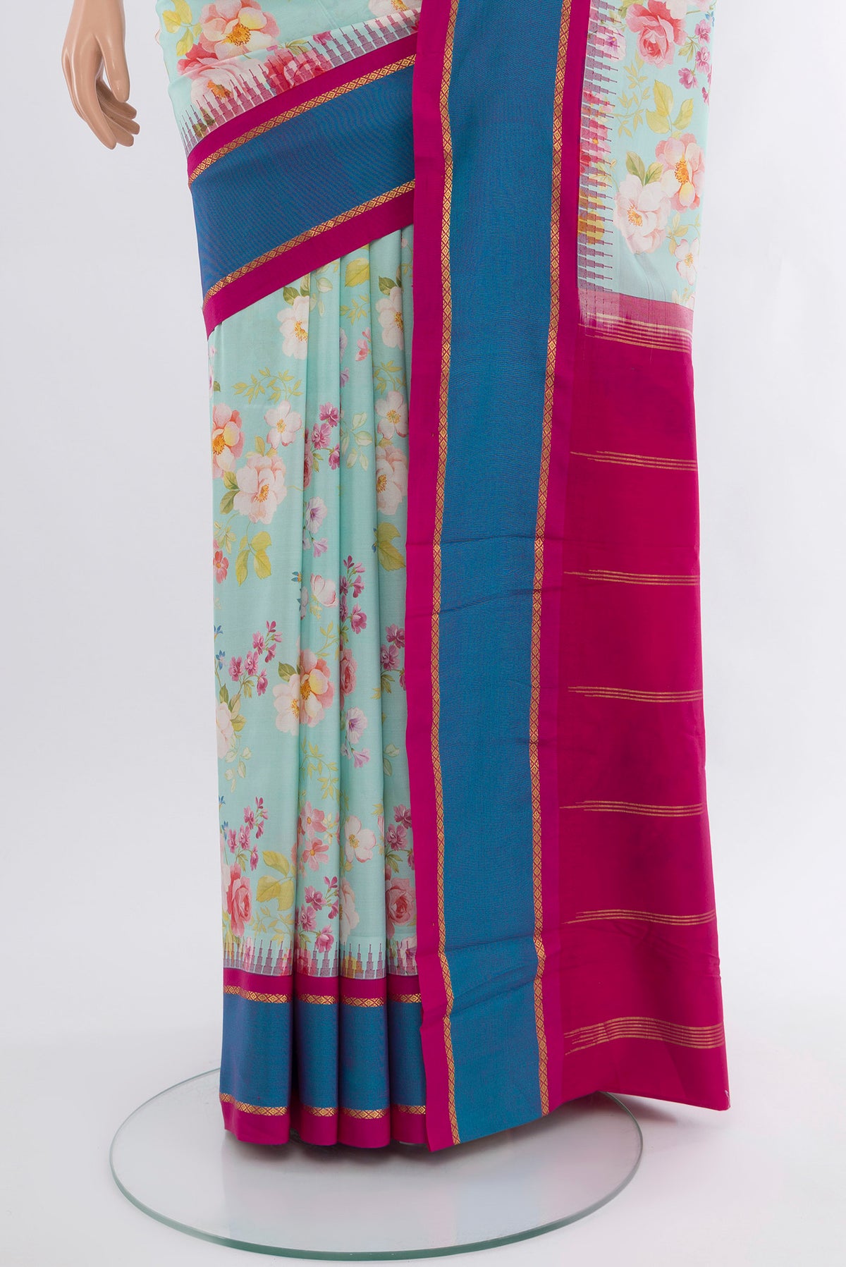 Pleats and pallu of Sky Blue Printed Silk Saree with Floral Print on the body and Rising Temple Border. 