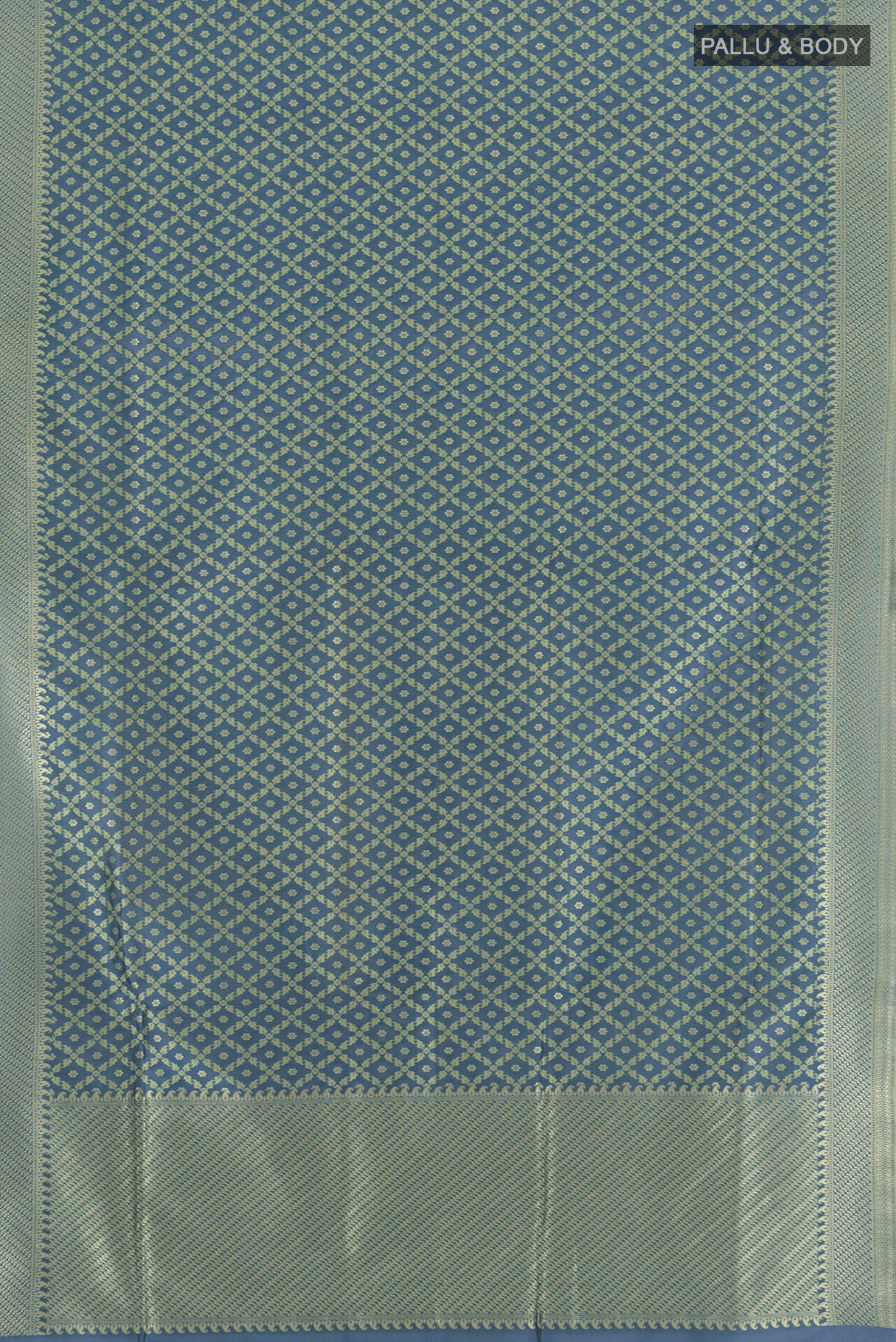 Flat view of Blue Grey Banarasi Silk Saree with Floral Print on the body and Zari Border. 