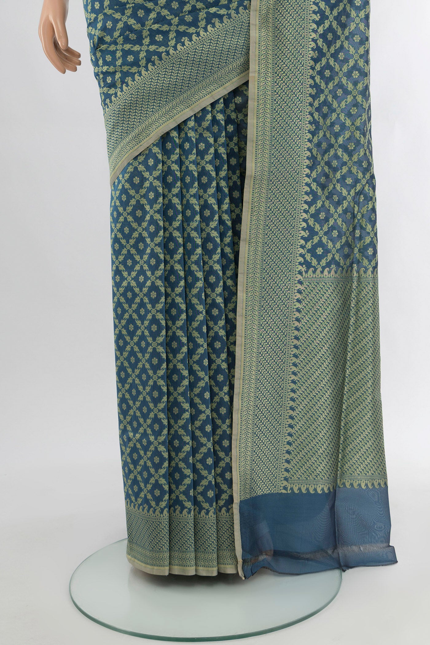 Pleats and pallu of Blue Grey Banarasi Silk Saree with Floral Print on the body and Zari Border. 