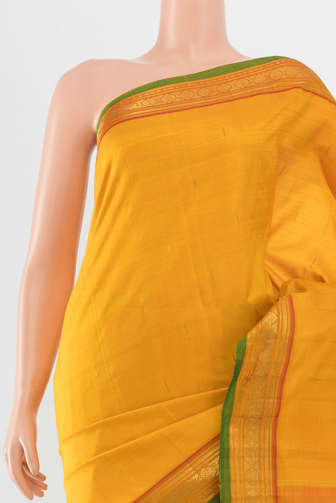 Border image of Yellow Kanjivaram Silk Saree with Zari Butta on the body and Silk Border. 