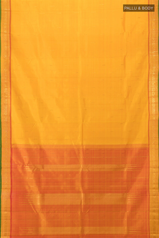 Flat view of Yellow Kanjivaram Silk Saree with Zari Butta on the body and Silk Border. 