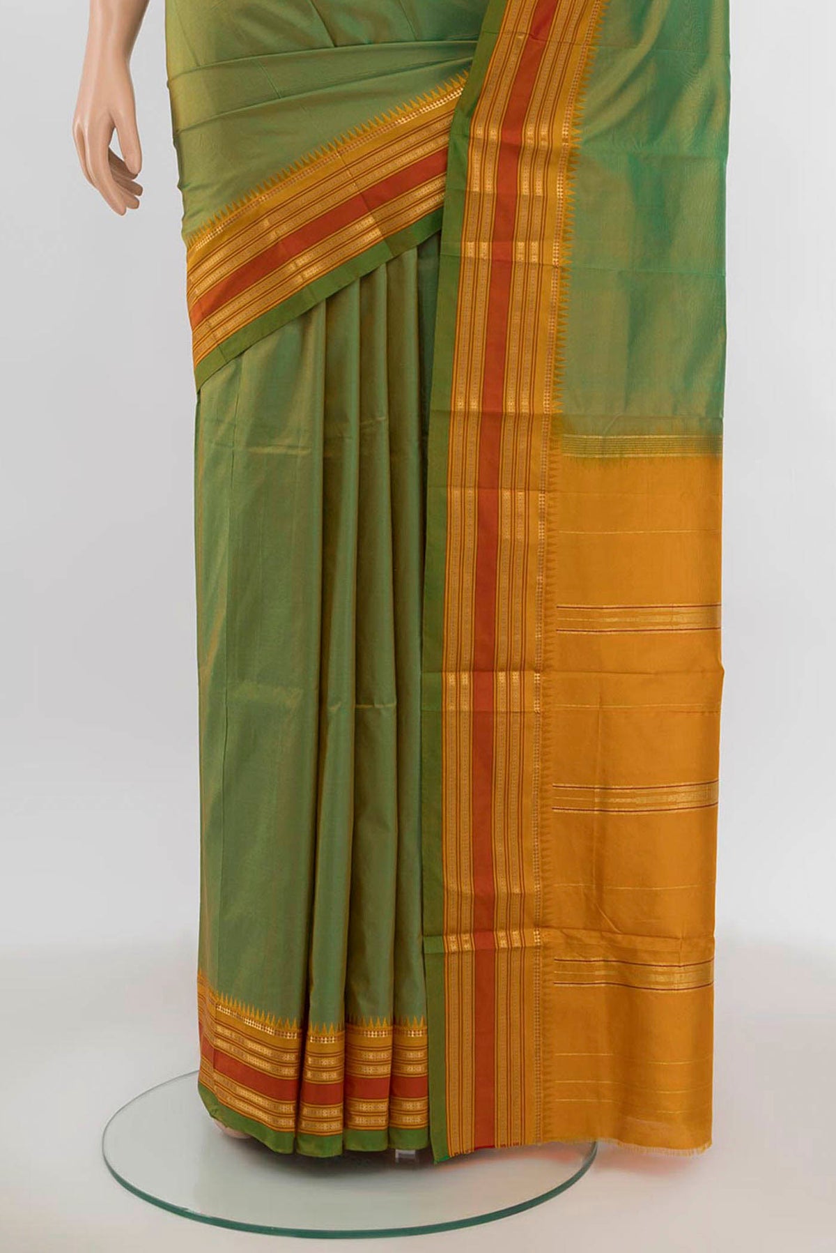 Pleats and pallu of Parrot Green Narayanpet Silk Saree with Zari Butta on the body and Silk Border. 