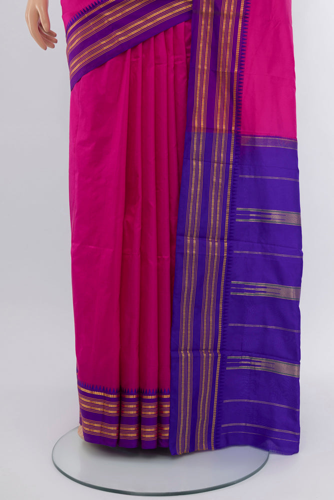 Pleats and pallu of Magenta Narayanpet Silk Saree with Zari Butta on the body and Silk Border. 