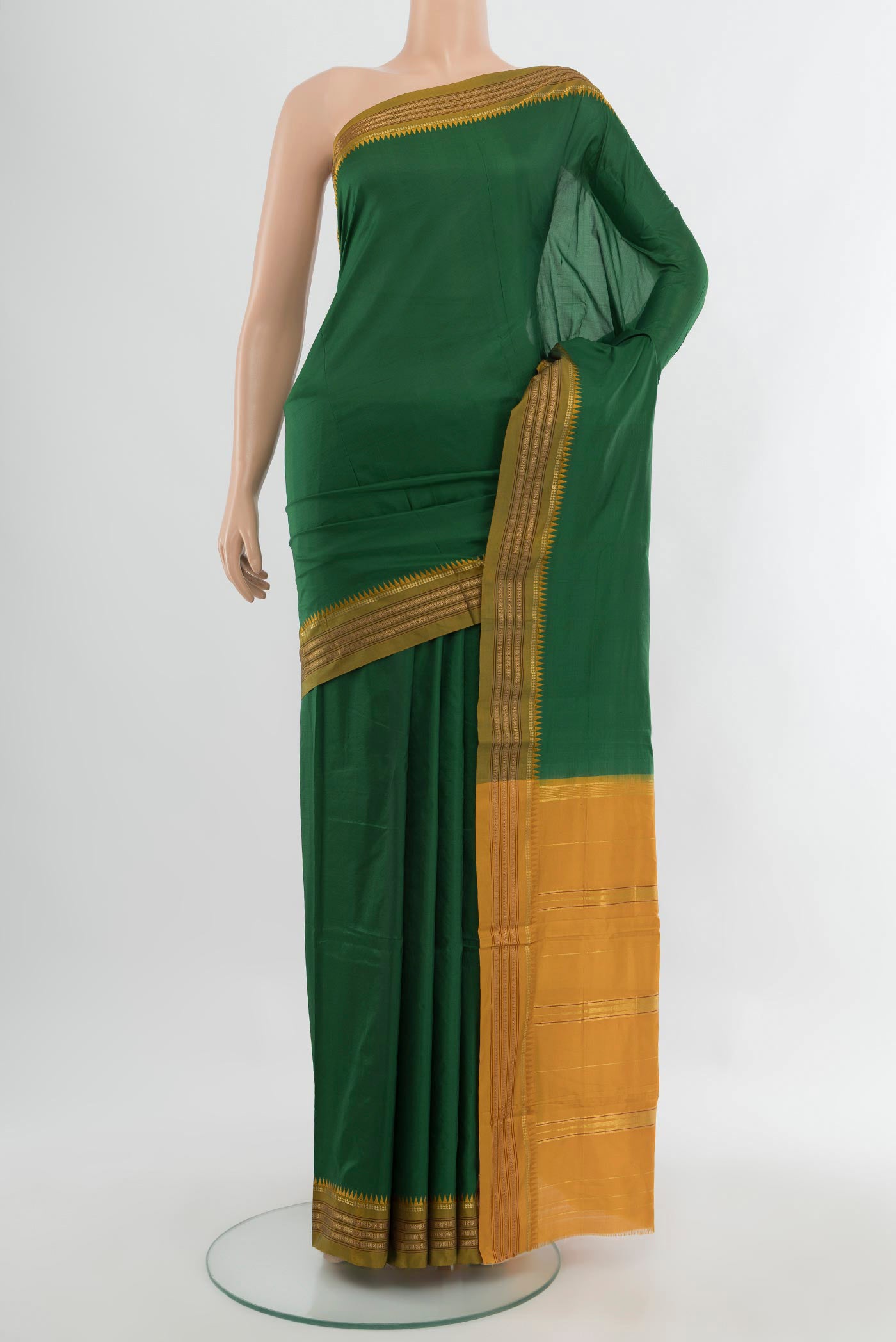 Mint Green Narayanpet Silk Saree with Plain Body and Silk Border.  displayed on a mannequin