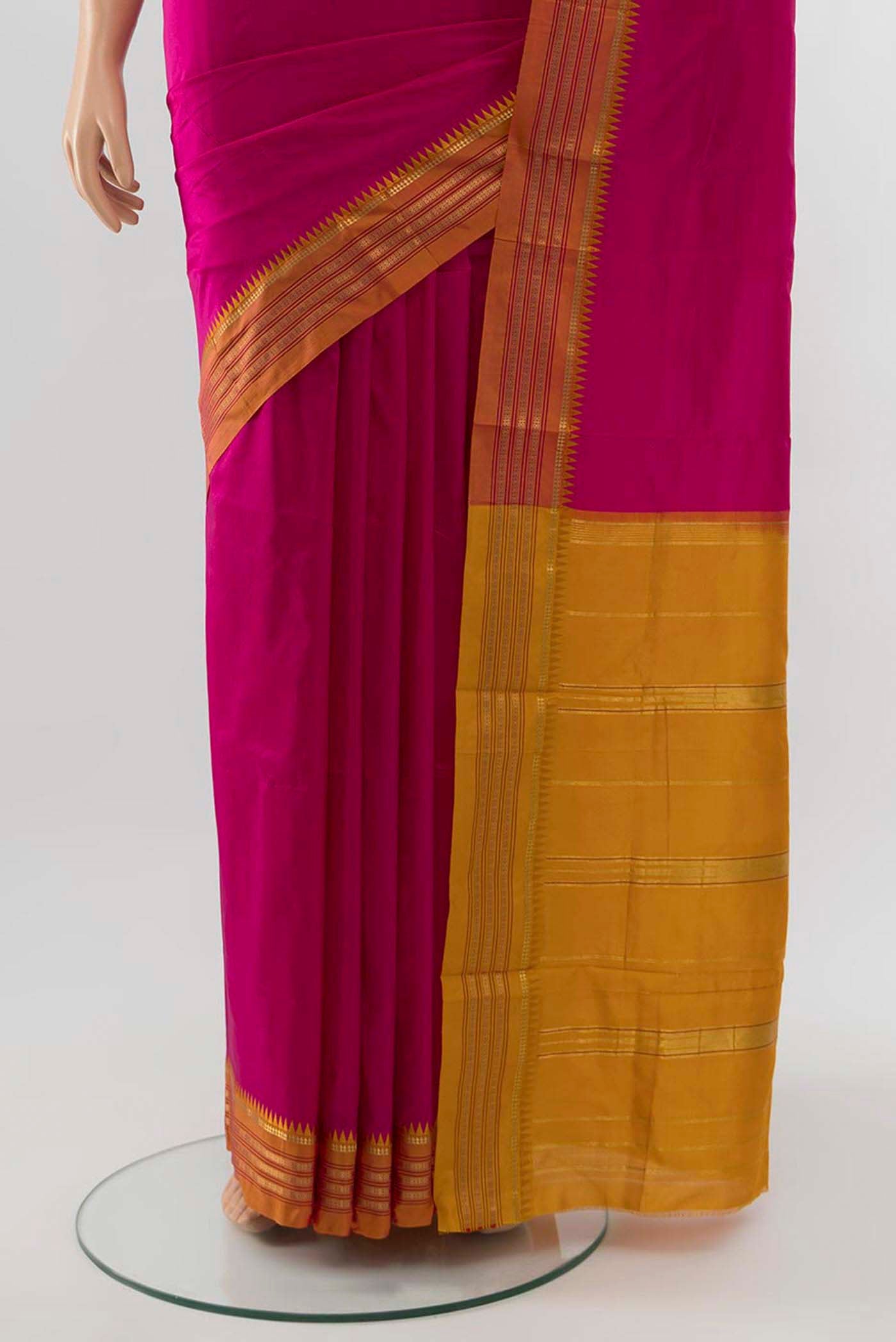 Pleats and pallu of Magenta Narayanpet Silk Saree with Zari Brocade on the body and Silk Border