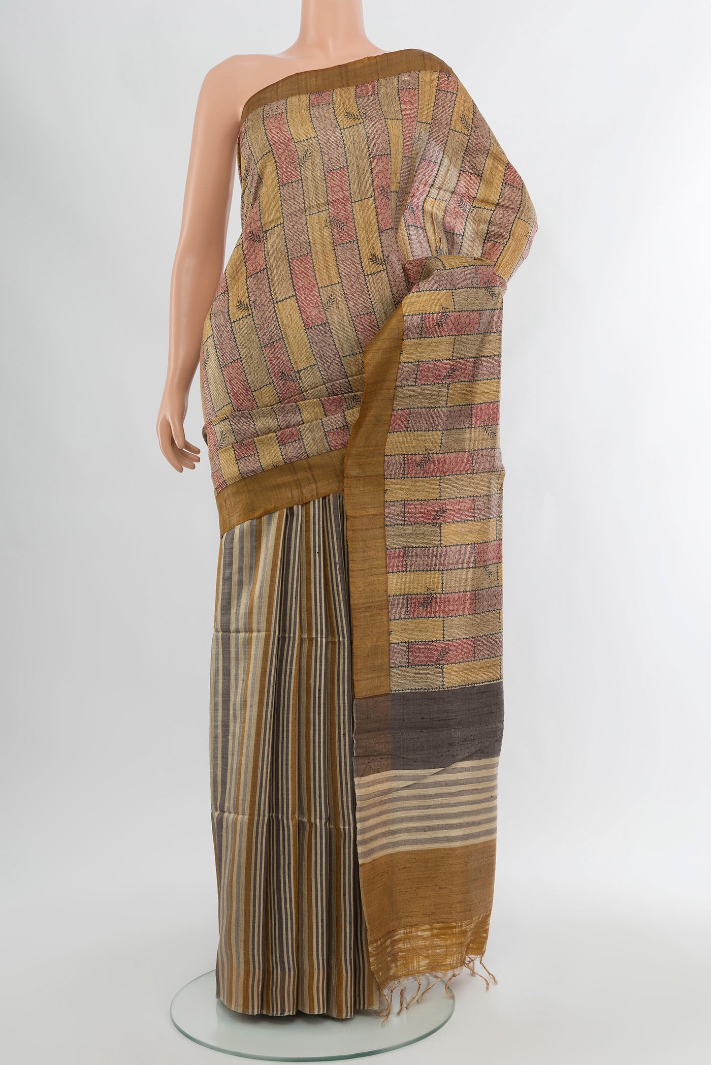 Multi Color Tussar Silk Saree with Floral Print on the body and Plain Border.  displayed on a mannequin
