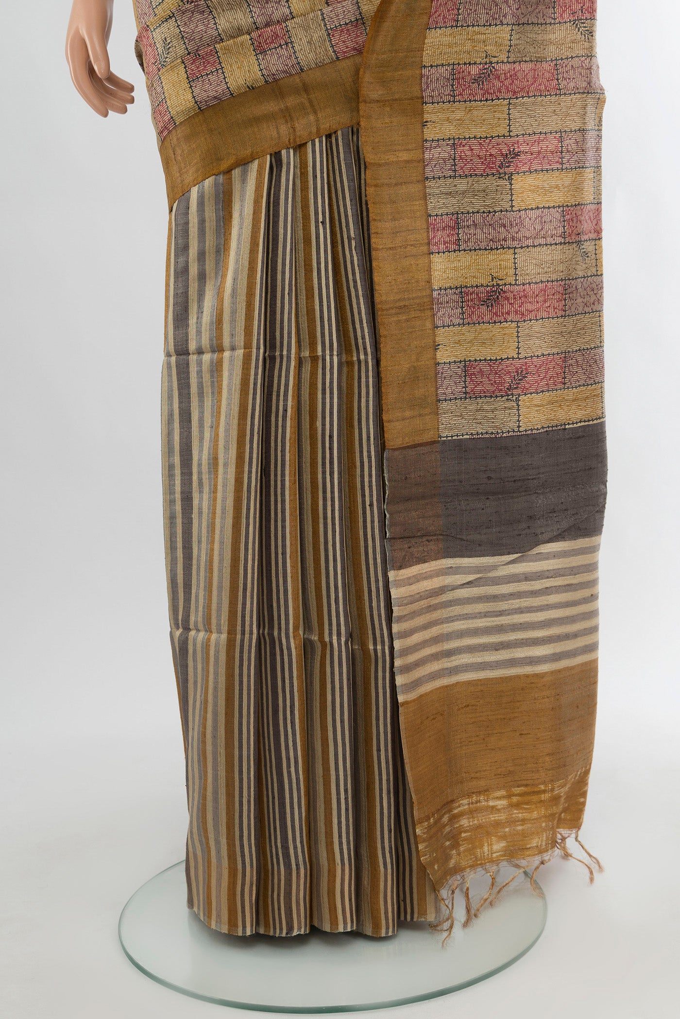 Pleats and pallu of Multi Color Tussar Silk Saree with Floral Print on the body and Plain Border. 