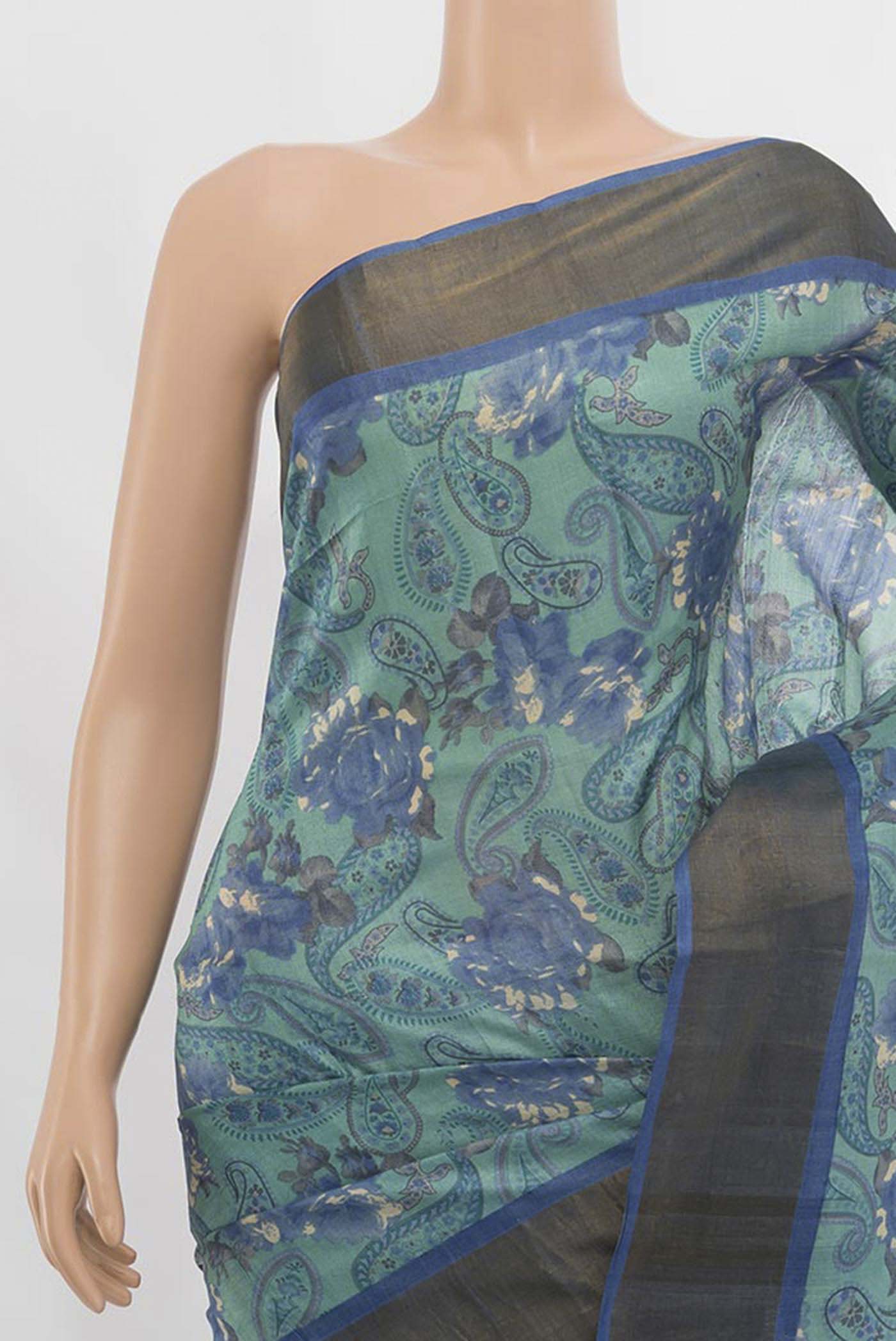 Border image of Sky Blue Tussar Silk Saree with Floral Print on the body and Silk Border. 
