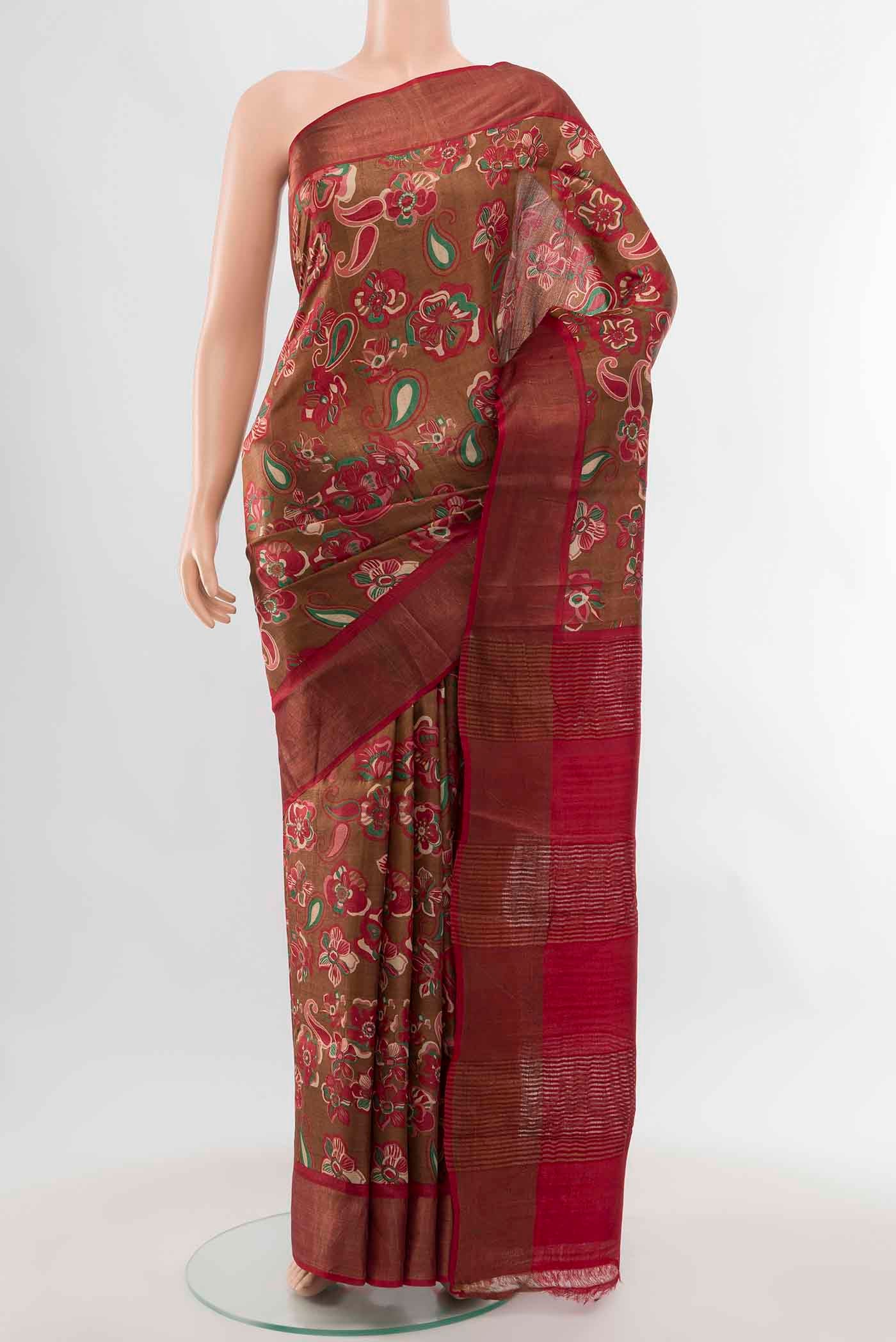 Brown Tussar Silk Saree with Zari Butta on the body and Silk Border displayed on a mannequin