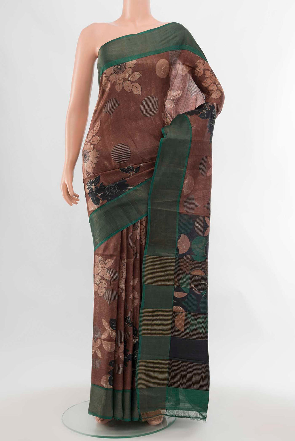 Coffee Brown Tussar Silk Saree with Zari Butta on the body and Silk Border displayed on a mannequin
