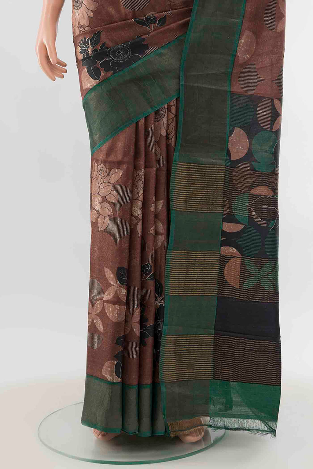 Pleats and pallu of Coffee Brown Tussar Silk Saree with Zari Butta on the body and Silk Border