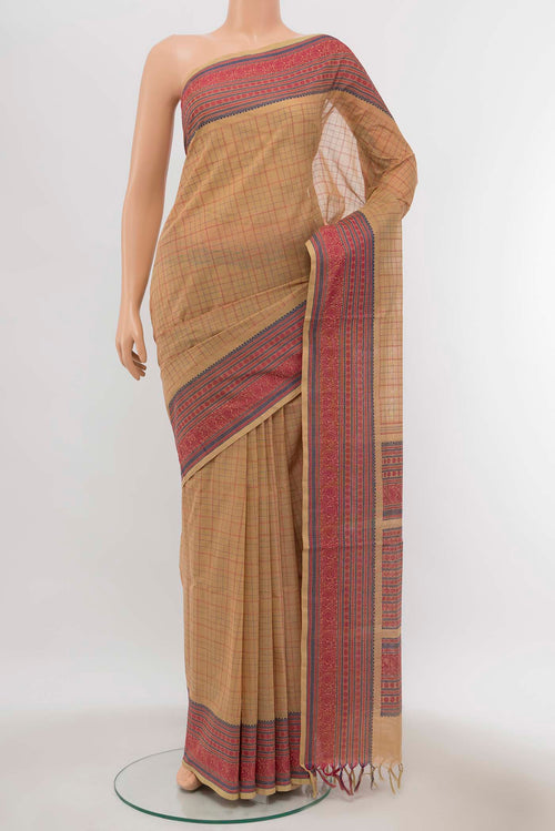 Beige Chettinad Cotton Saree with Thread Butta on the body and Thread Border displayed on a mannequin