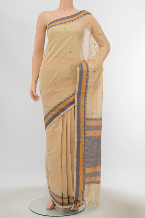 Beige Coimbatore Cotton Saree with Thread Butta on the body and Thread Border displayed on a mannequin