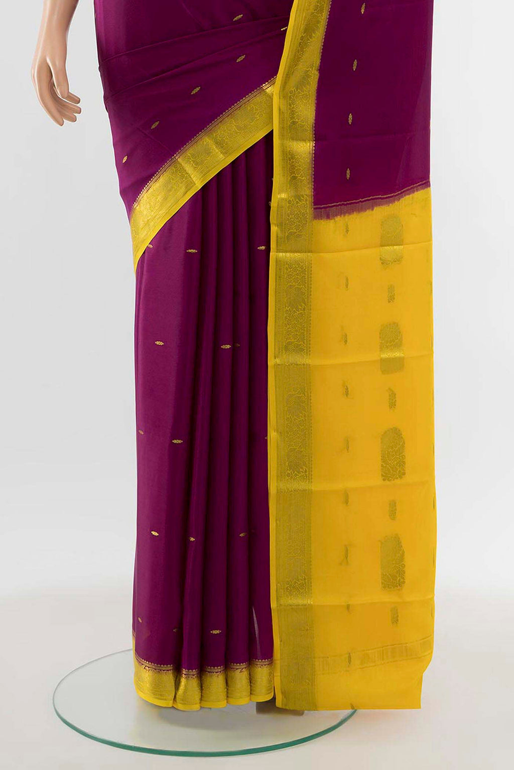 Pleats and pallu of Purple Mysore Crepe Saree with Zari Butta on the body and Silk Border