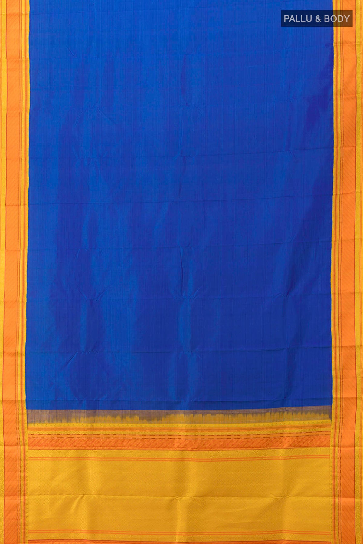 Flat view of Blue Kanchipuram Silk Saree with Zari Butta on the body and Silk Border