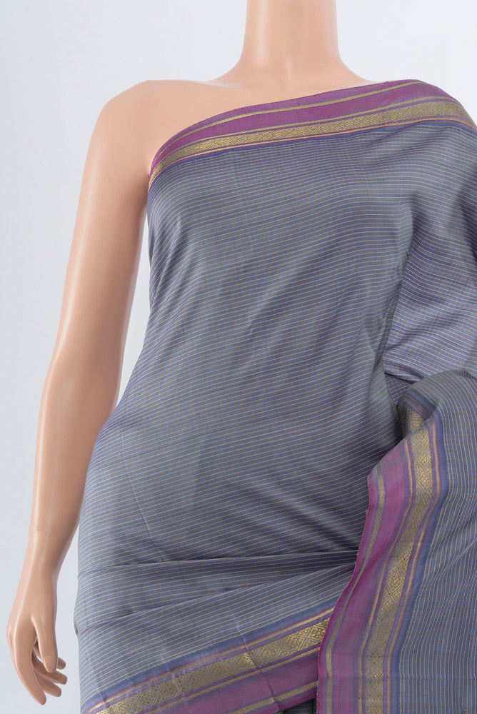 Border image of Davys Grey Kanjivaram Silk Saree with Zari Butta on the body and Silk Border. 