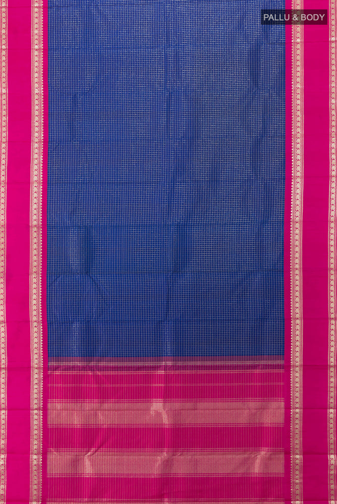 Flat view of Dark Blue Kanjivaram Silk Saree with Zari Butta on the body and Silk Border. 