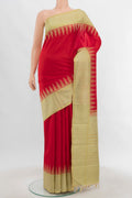 Red Kanjivaram Silk Saree with Zari Butta on the body and Zari Border.  displayed on a mannequin