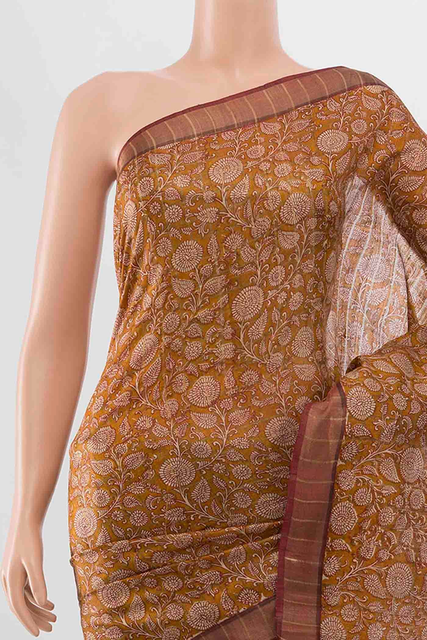 Border image of Mustard Tussar Silk Saree with Floral Print on the body and Zari Border