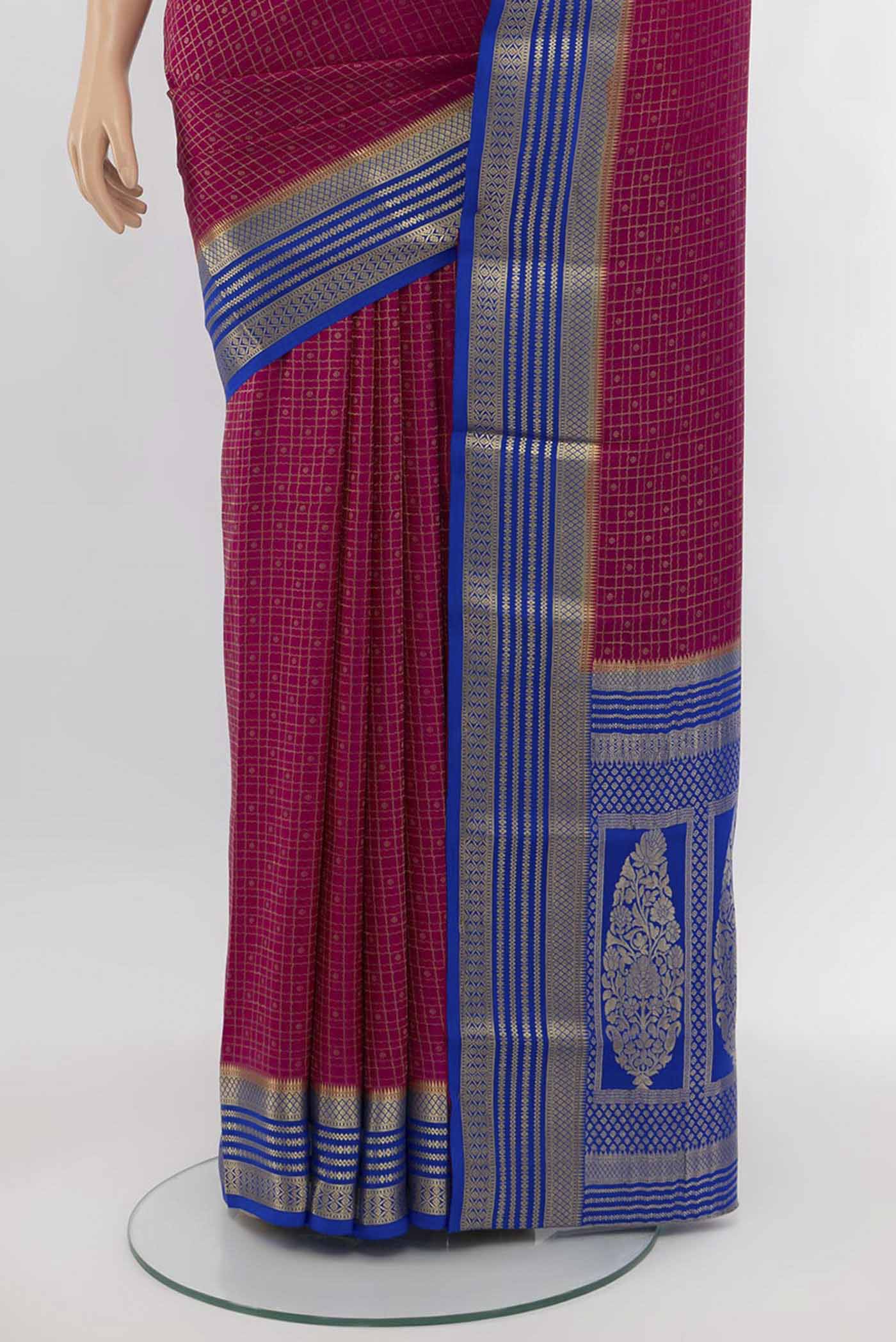 Pleats and pallu of Magenta Mysore Crepe Saree with Zari Butta on the body and Silk Border. 