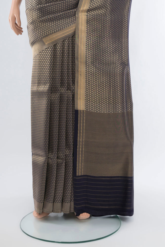 Pleats and pallu of Navy Blue Banarasi Katan Silk Saree with Zari Butta on the body and Silk Border. 