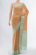 Peach Mysore Crepe Saree with Zari Butta on the body and Fancy Border displayed on a mannequin