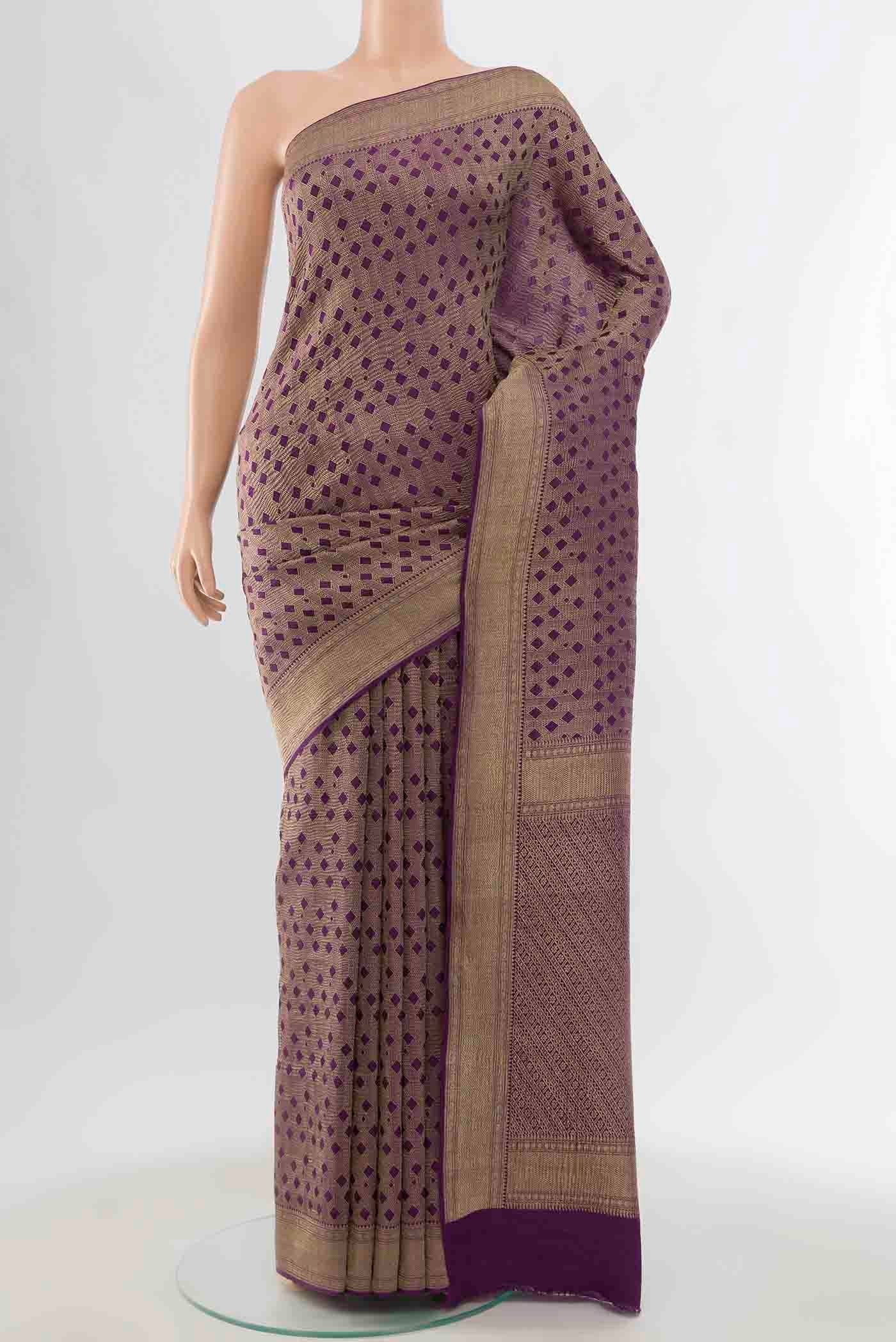 Violet Mysore Crepe Saree with Zari Brocade on the body and Zari Border displayed on a mannequin