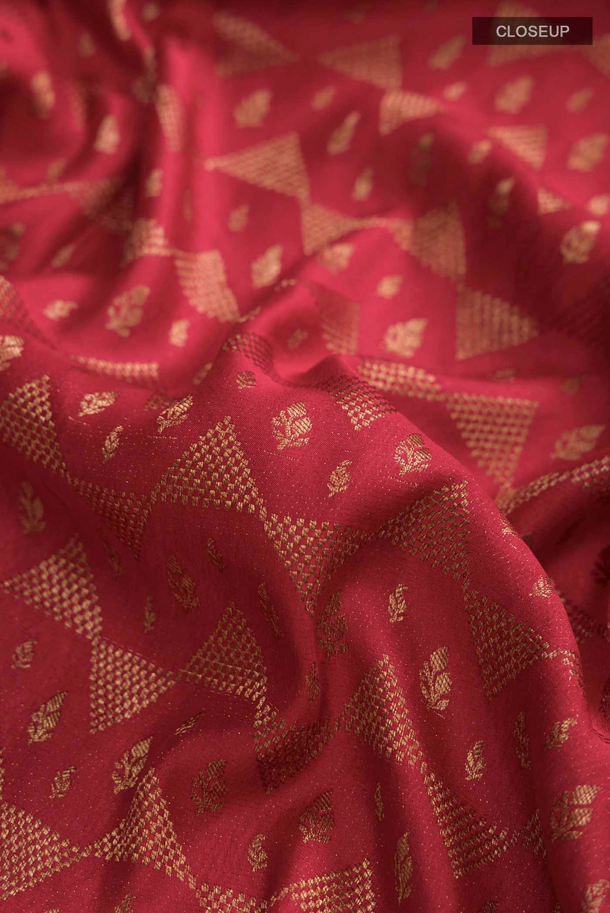 Close up of Maroon Mysore Crepe Saree with Zari Brocade on the body and Zari Border displaying folds